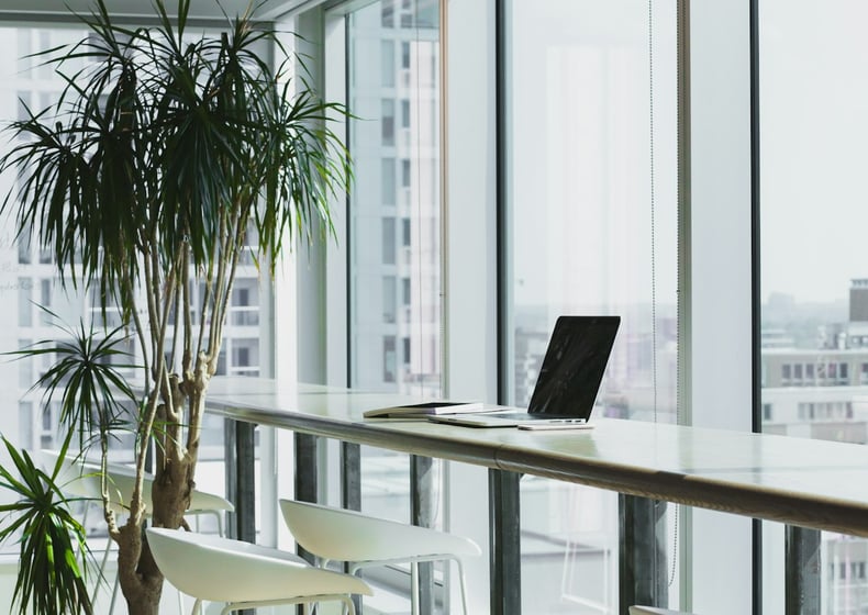 Office desk by a large window